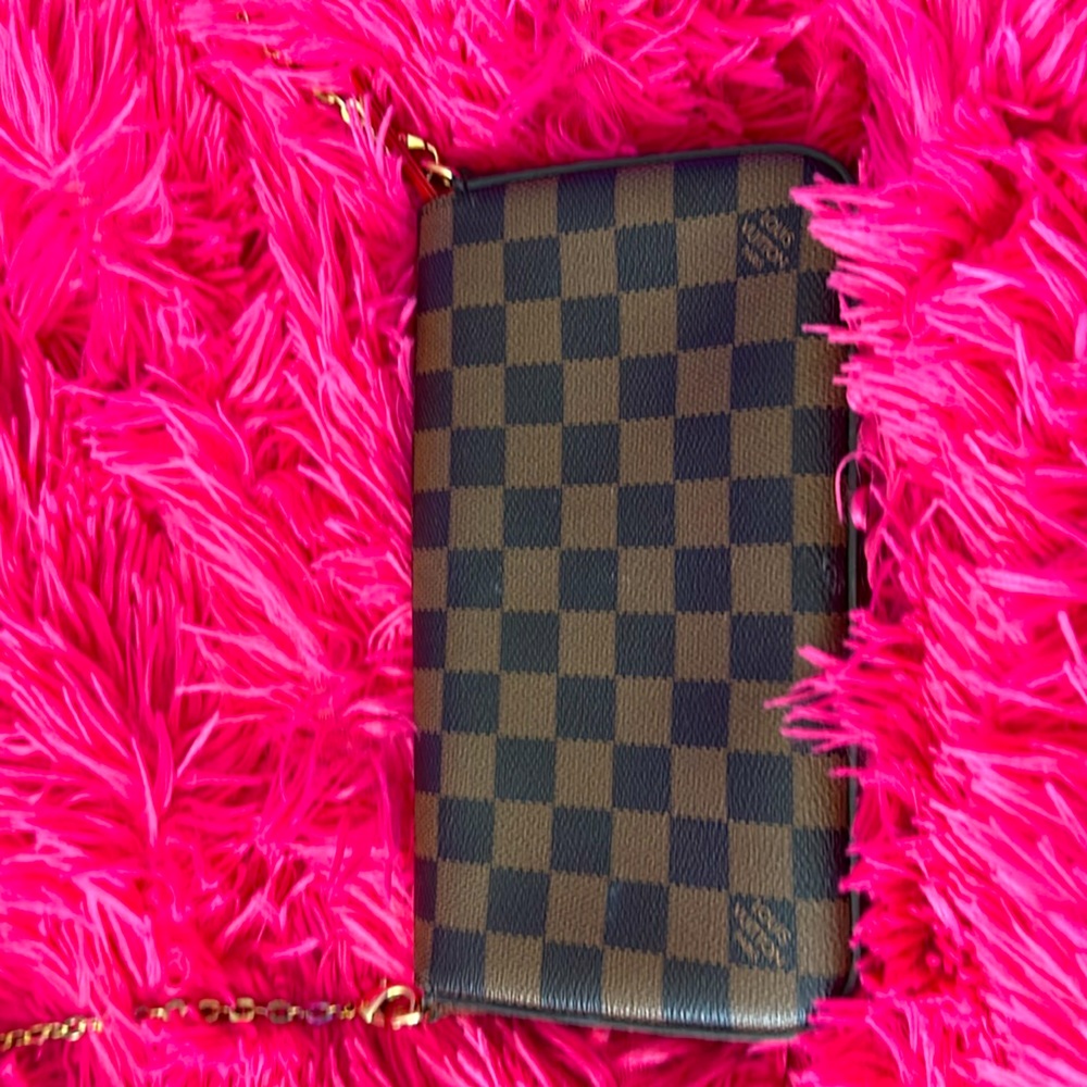 Félice pochette in the color monogram